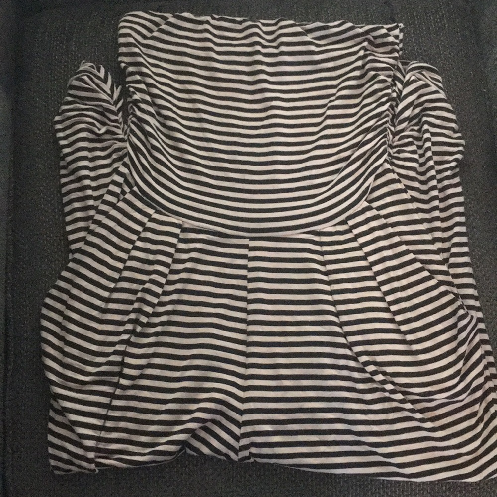 Women’s tan jumpsuit with black stripes